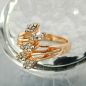 Preview: Ring 17mm Blütenranke rotvergoldet mit 5 Blättern mit Glassteinen Ringgröße 54