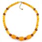 Preview: Kette 23x18mm Walze Kunststoff hell und dunkel bernsteinfarbig 55cm