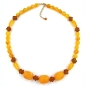 Preview: Kette 23x18mm Walze Kunststoff hell und dunkel bernsteinfarbig 55cm