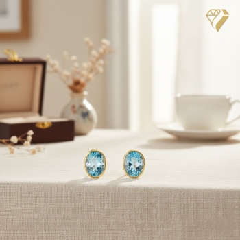 Preview: Ohrstecker Aquamarin 7x9mm oval 585 Gold